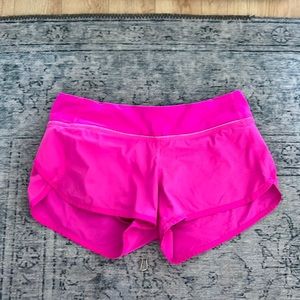 size 6 lululemon running shorts with built in briefs and zip back pocket